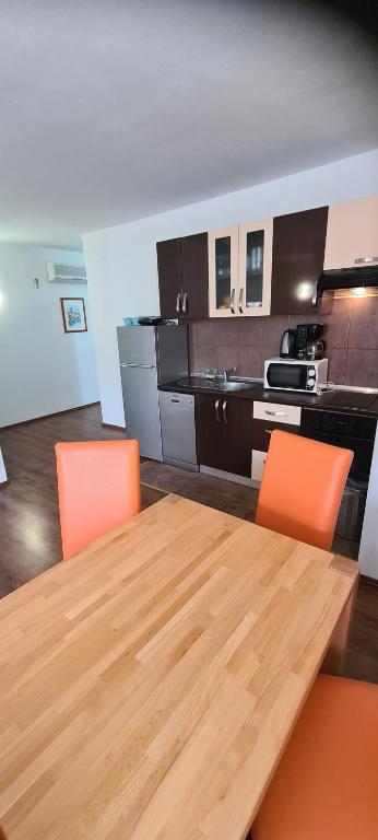 Kuchyň nebo kuchyňský kout v ubytování Apartments Mery