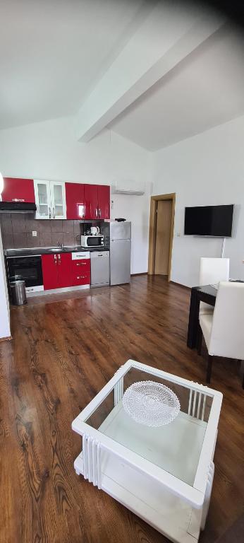 Kuchyň nebo kuchyňský kout v ubytování Apartments Mery