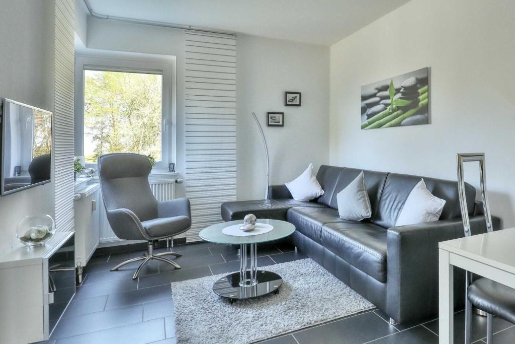 Posezení v ubytování Terrassenhaus, FeWo 20