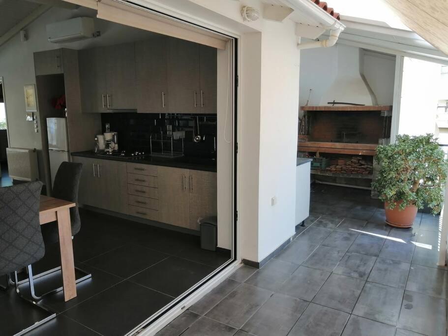 Kuchyň nebo kuchyňský kout v ubytování Manolis Loft