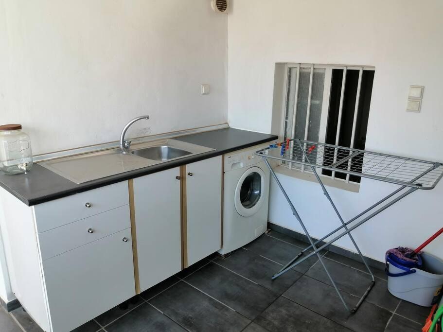 Kuchyň nebo kuchyňský kout v ubytování Manolis Loft