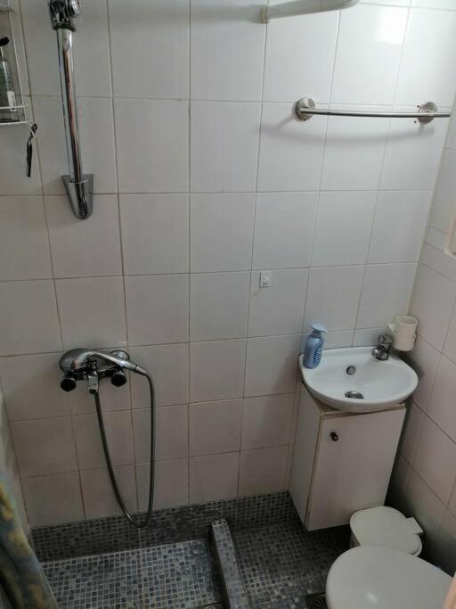 Koupelna v ubytování Manolis Loft