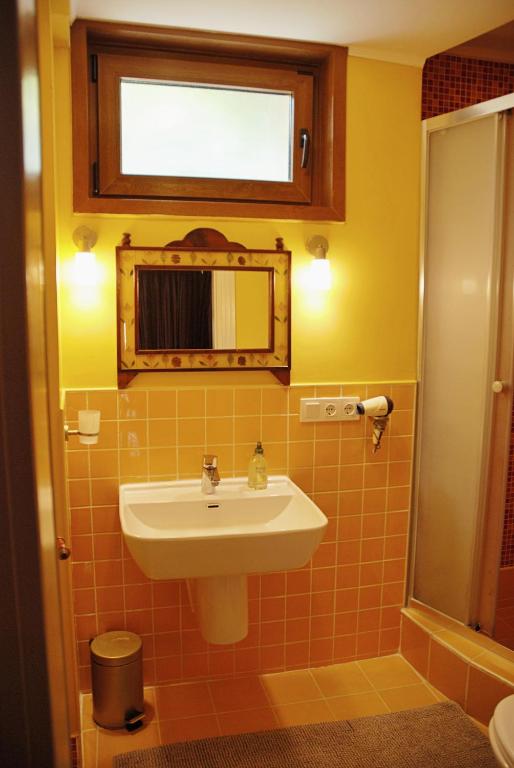Koupelna v ubytování L'isola Guesthouse