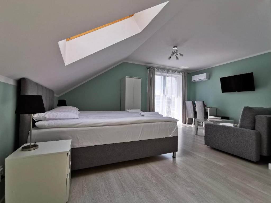 Postel nebo postele na pokoji v ubytování Villa Bianco