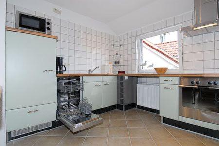 Kuchyň nebo kuchyňský kout v ubytování Haus Hafenblick