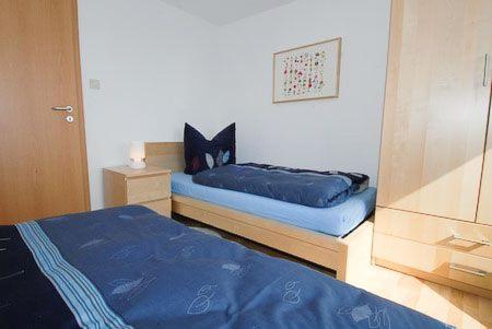 Postel nebo postele na pokoji v ubytování Haus Hafenblick