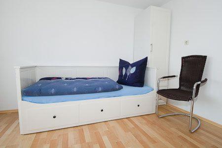 Postel nebo postele na pokoji v ubytování Haus Hafenblick