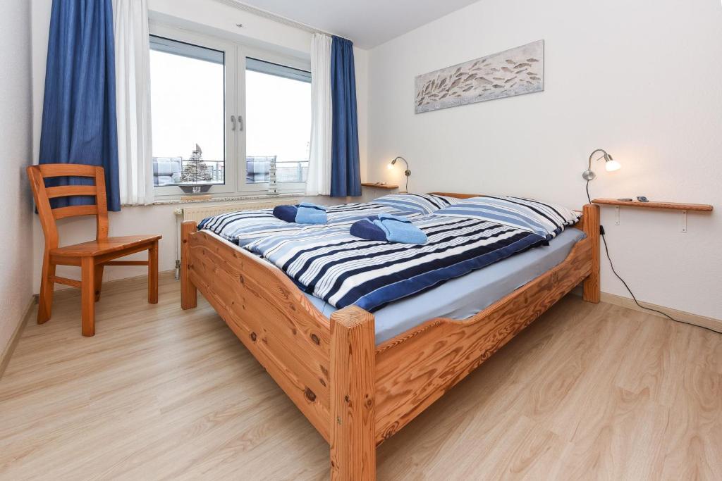 Postel nebo postele na pokoji v ubytování Haus Hafenblick