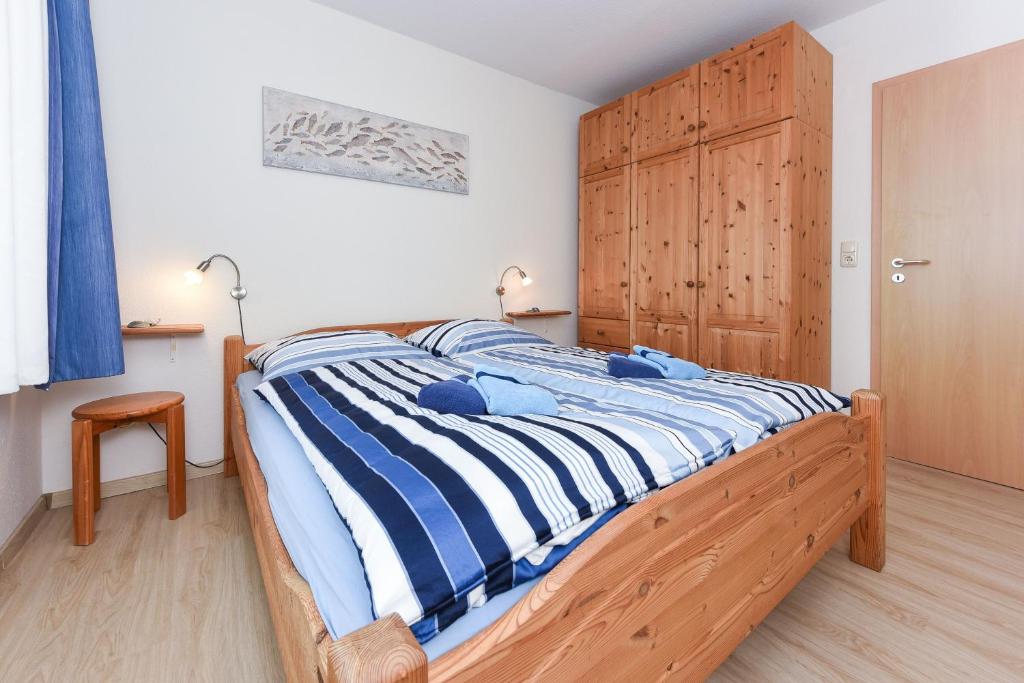 Postel nebo postele na pokoji v ubytování Haus Hafenblick