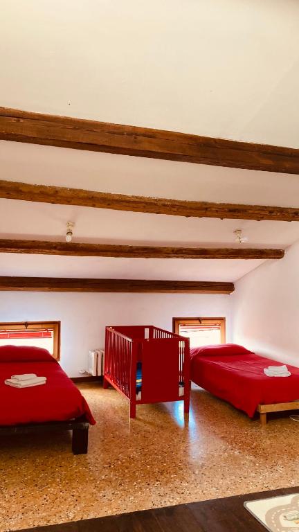 A bed or beds in a room at Cà Sardi