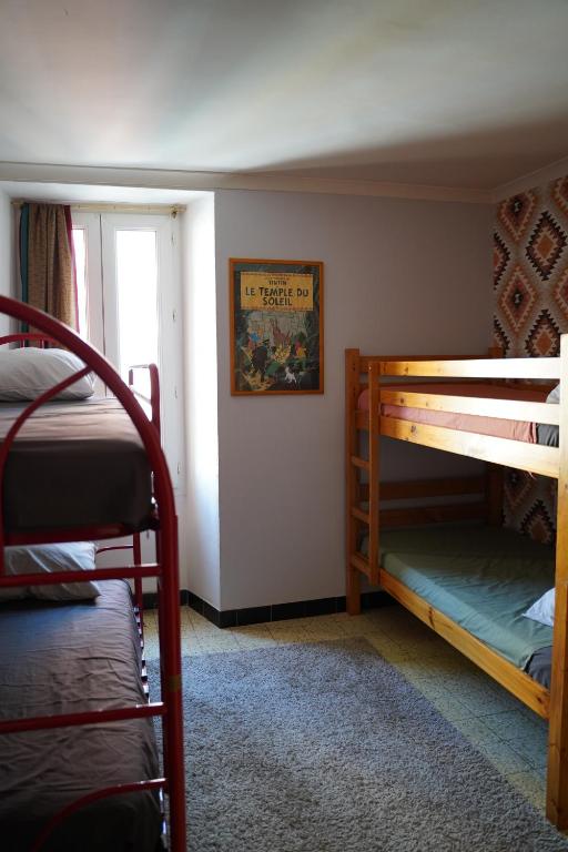 Postel nebo postele na pokoji v ubytování Lily à l'auberge