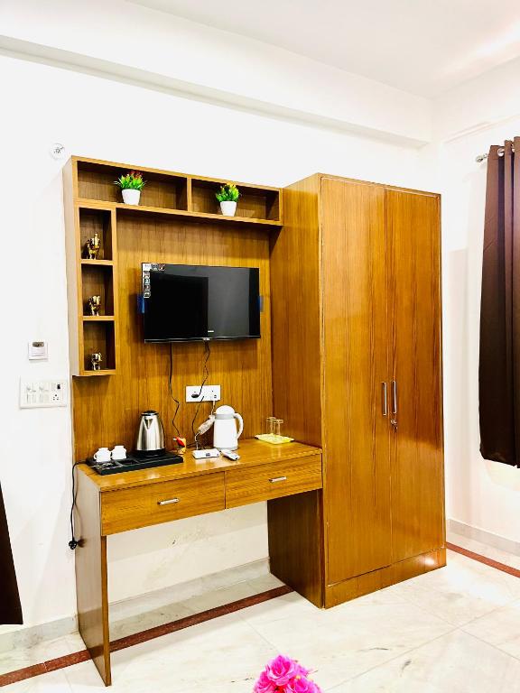 TV a/nebo společenská místnost v ubytování SRH HOTEL
