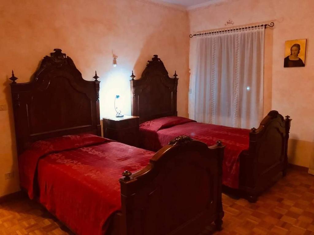 Postel nebo postele na pokoji v ubytování Corte dei Molini