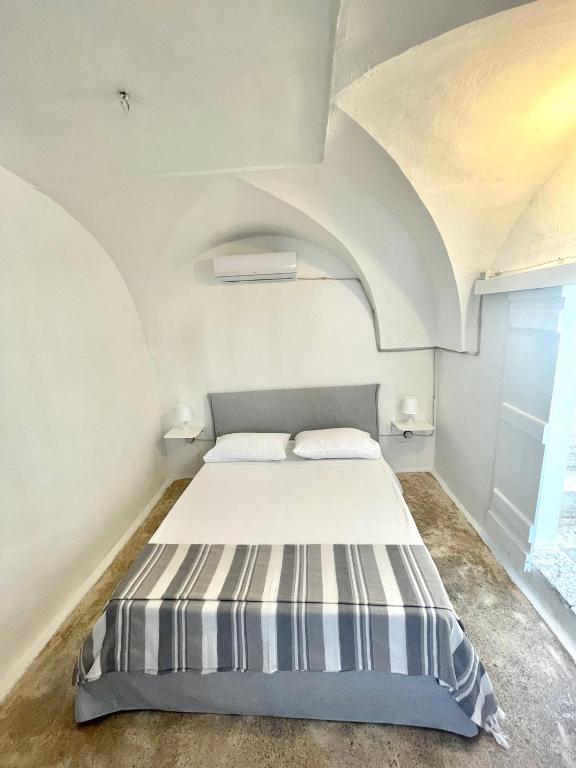 Posteľ alebo postele v izbe v ubytovaní Casa Margherita