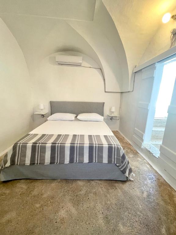 Posteľ alebo postele v izbe v ubytovaní Casa Margherita