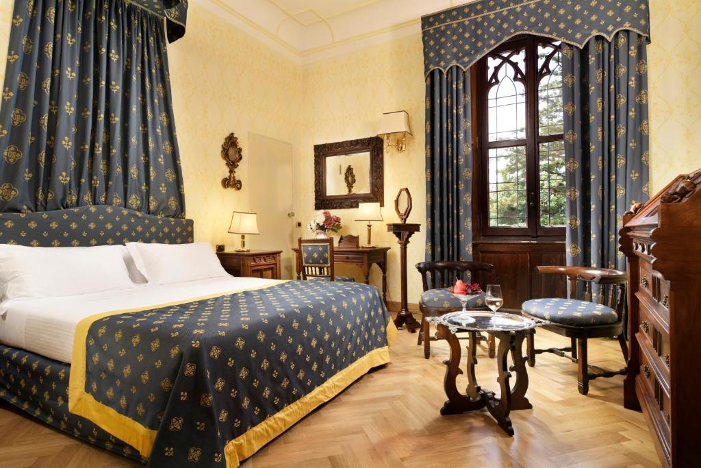 Postel nebo postele na pokoji v ubytování Castello Dal Pozzo Resort Lago Maggiore - Preferred Hotels & Resorts