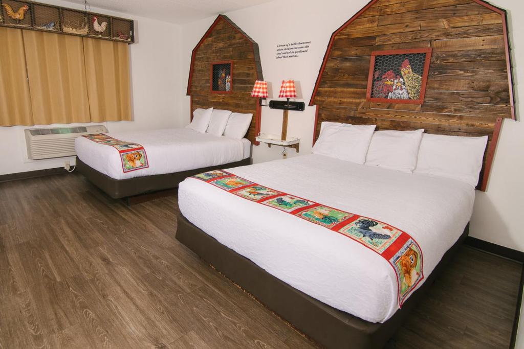 Ліжко або ліжка в номері Riverside Inn