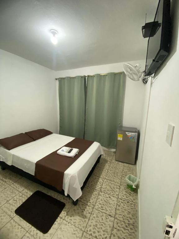 Postel nebo postele na pokoji v ubytování HOSPEDAJE'S HE