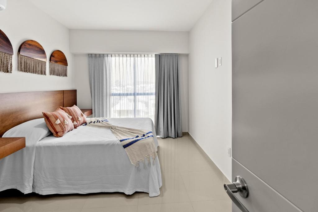 Postel nebo postele na pokoji v ubytování Casa Barros Vacation Condos