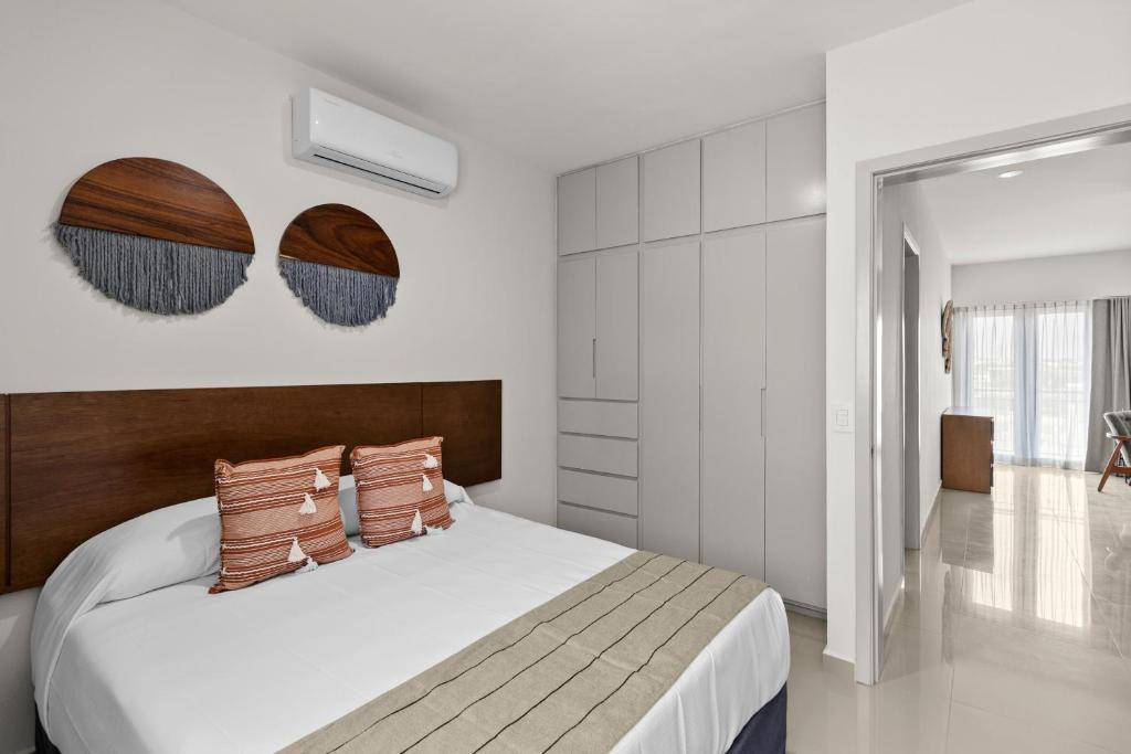 Postel nebo postele na pokoji v ubytování Casa Barros Vacation Condos