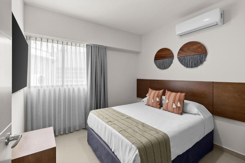 Postel nebo postele na pokoji v ubytování Casa Barros Vacation Condos