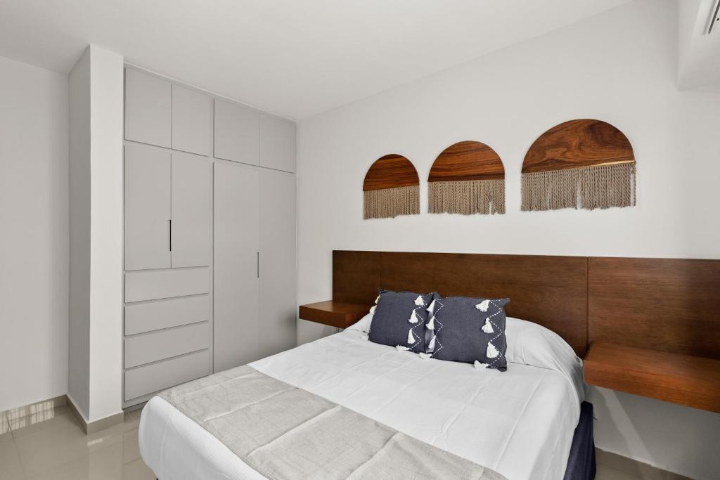 Cama o camas de una habitación en Casa Barros Vacation Condos