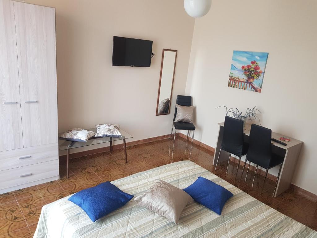 Postel nebo postele na pokoji v ubytování B&B EMPIRA Lamezia Terme
