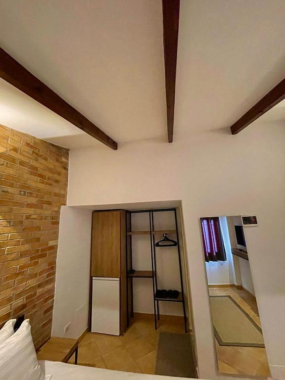 Postel nebo postele na pokoji v ubytování Hotel Kappa3 Villas