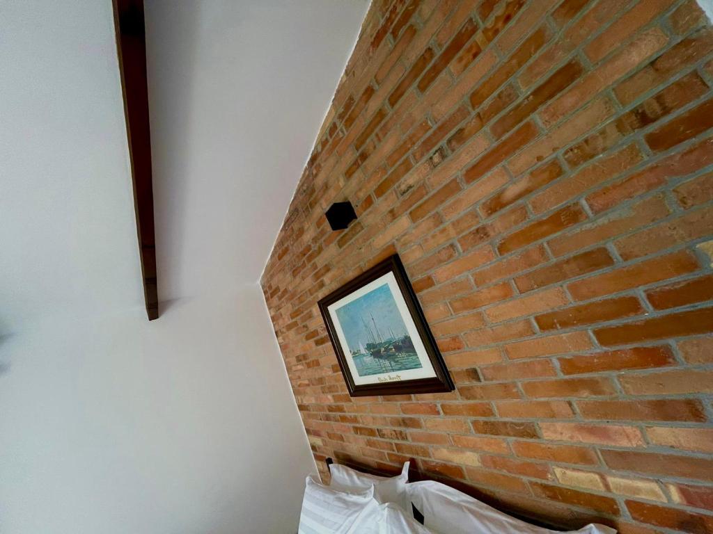 Postel nebo postele na pokoji v ubytování Hotel Kappa3 Villas