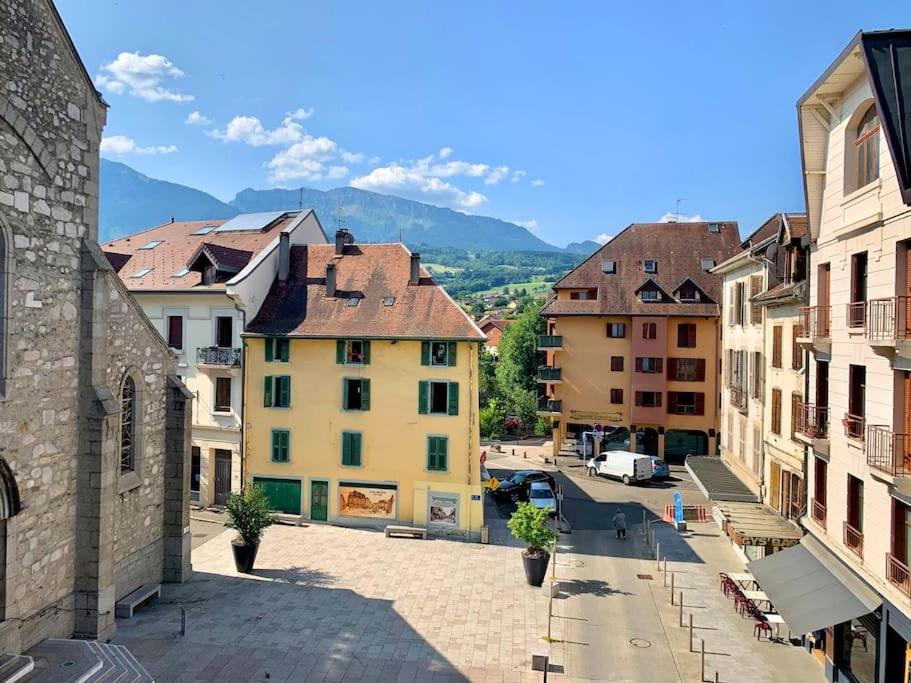 a view of a city with buildings and a street at Apartment with mountain views in town centre in La Roche-sur-Foron