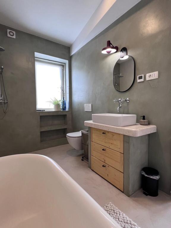 Łazienka w obiekcie Apartments Forum 2