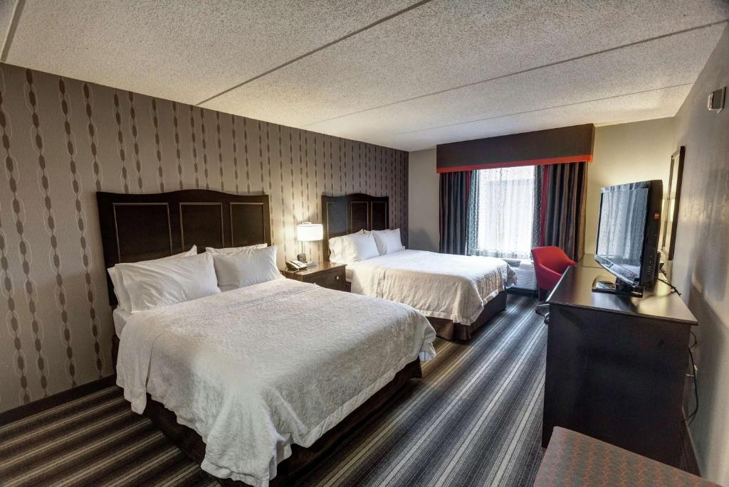 Postel nebo postele na pokoji v ubytování Hampton Inn Neptune