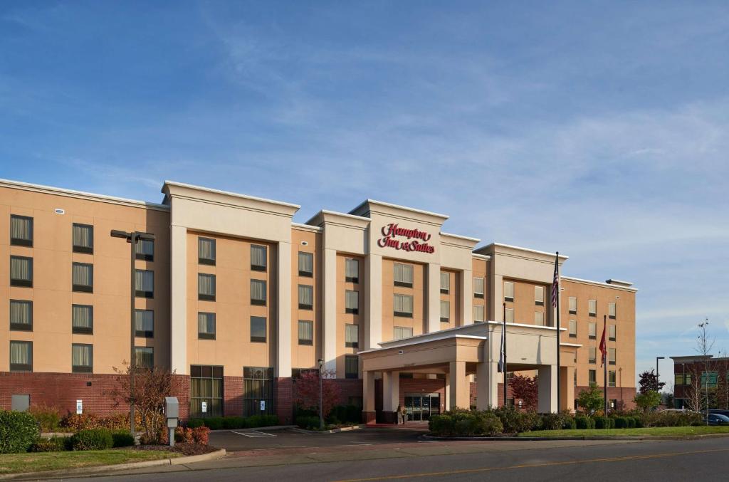 a hotel building with a sign on the front of it at Hampton Inn & Suites Mount Juliet in Mount Juliet