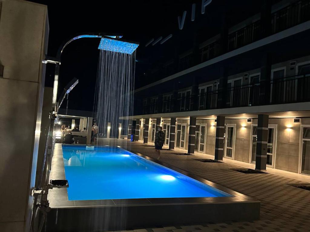 Bazén v ubytování VIP HOTEL ZATOKA nebo v jeho okolí