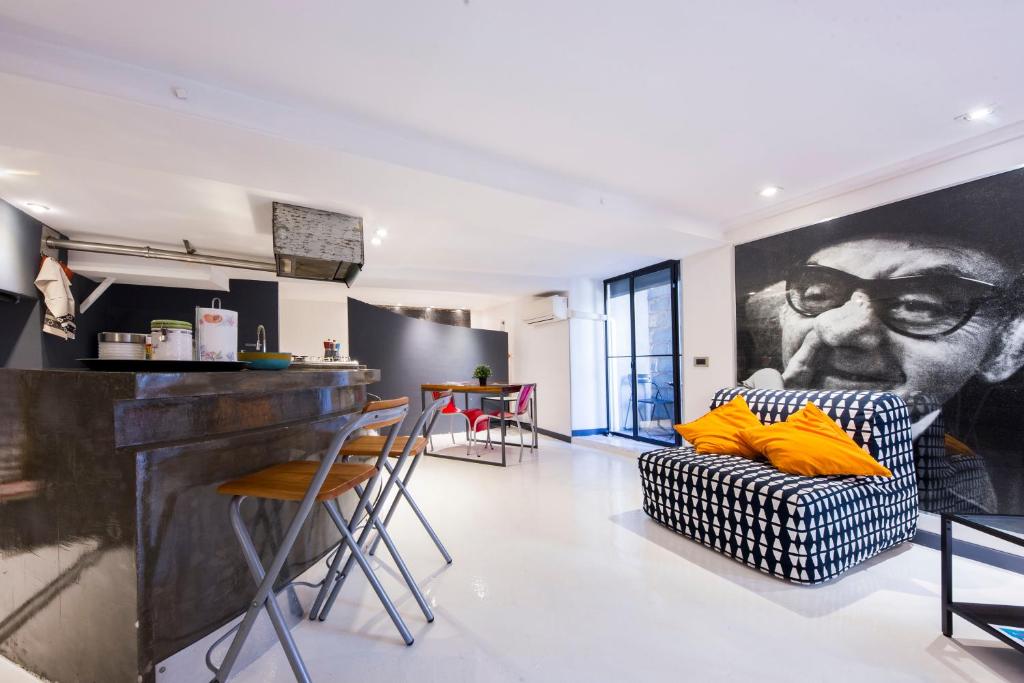 A kitchen or kitchenette at Loft La Città Vecchia