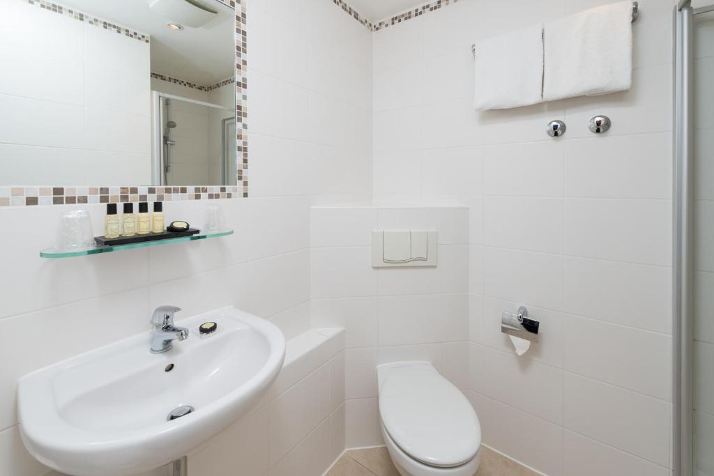 Koupelna v ubytování Hotel Munich Inn - Design Hotel