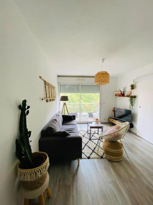 Et opholdsområde på Superbe appartement, parking privatif et piscine