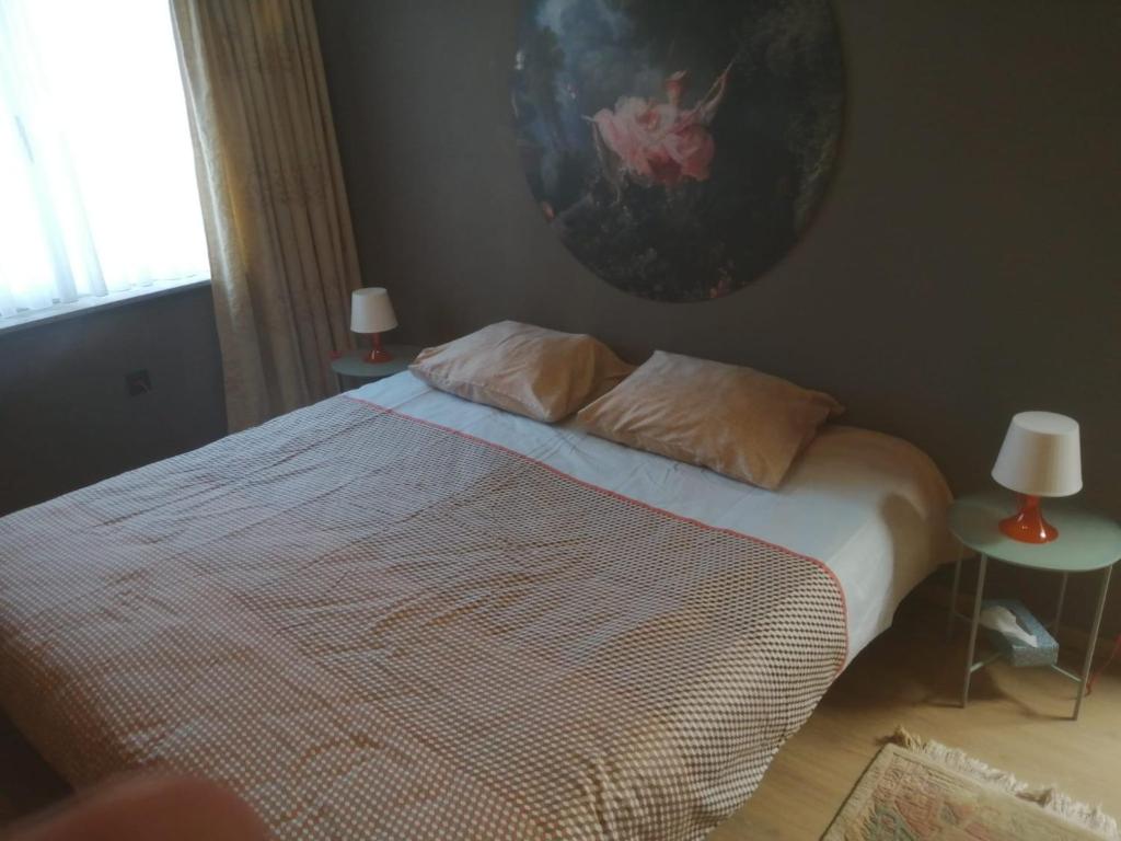 Un pat sau paturi într-o cameră la Residentie Kathy Westende