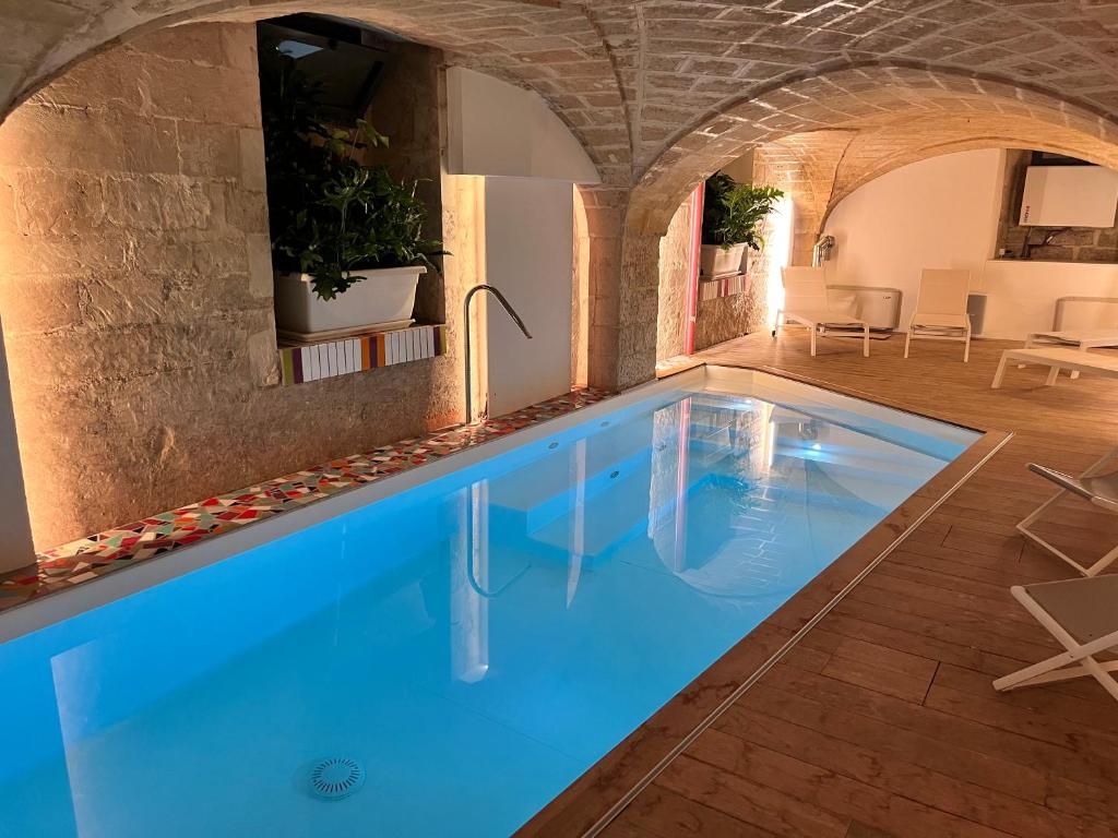 Bazén v ubytování VIANNA SUITES SPA nebo v jeho okolí