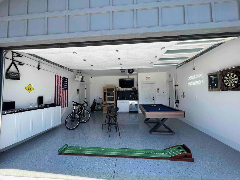 a garage with a ping pong table in it at Moses Lake Golf Retreat @ Resorts At Moses Pointe in Moses Lake