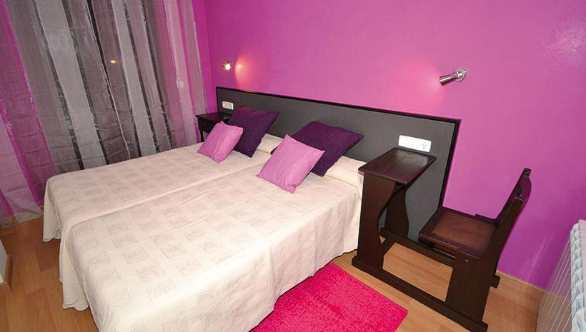 Postel nebo postele na pokoji v ubytování Apartamentos Turisticos Dormi2