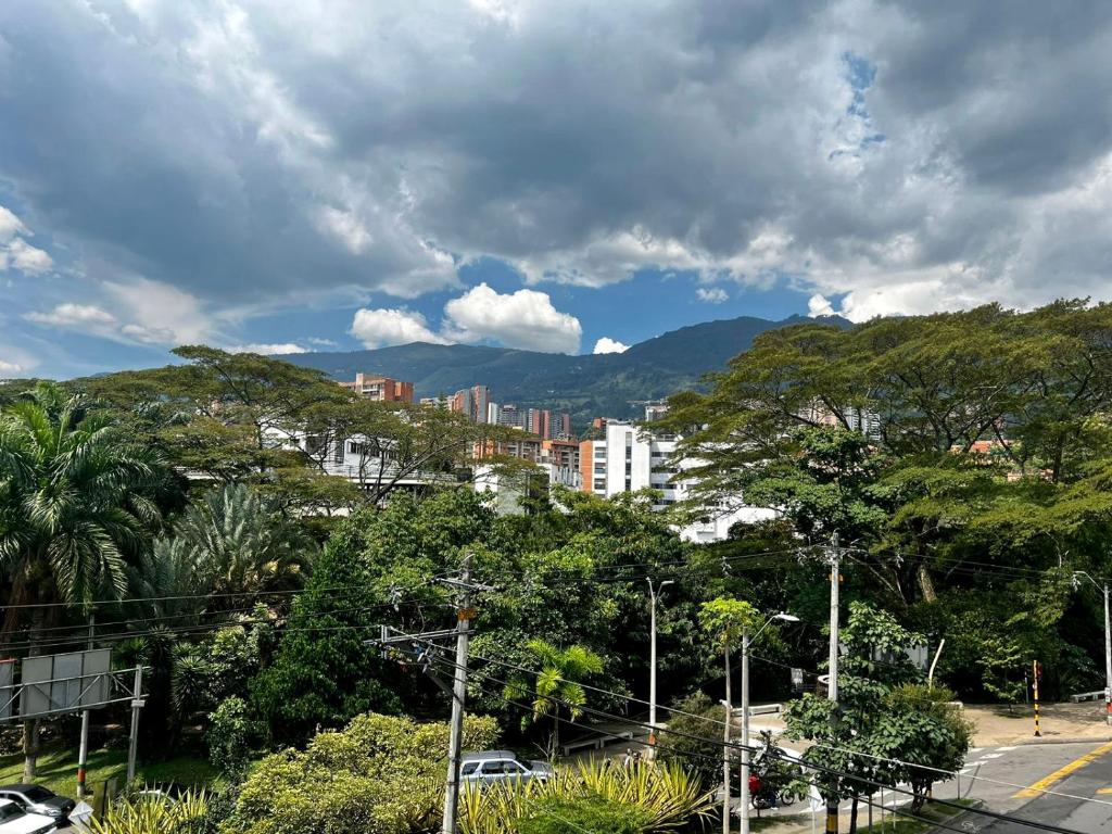 a view of a city with trees and buildings at Apartamento con Excelente Ubicación en Envigado in Envigado