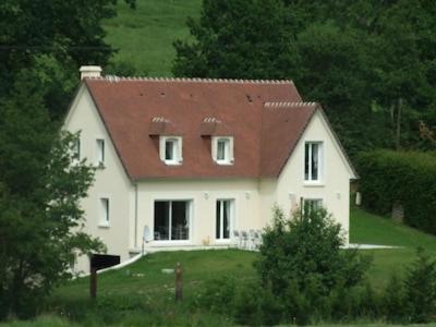 a large white house with a red roof at Prestig house in Danestal