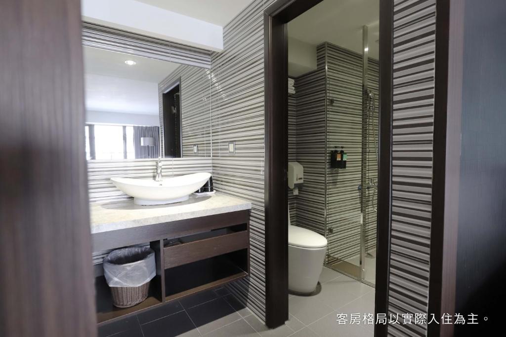 Koupelna v ubytování Talmud Hotel Yizhong