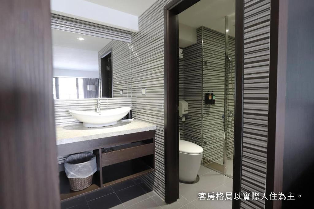 Koupelna v ubytování Talmud Hotel Yizhong