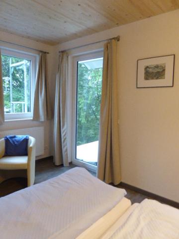 Postel nebo postele na pokoji v ubytování Hotel Hohe Flum