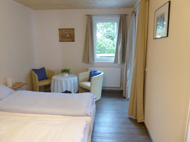 Postel nebo postele na pokoji v ubytování Hotel Hohe Flum