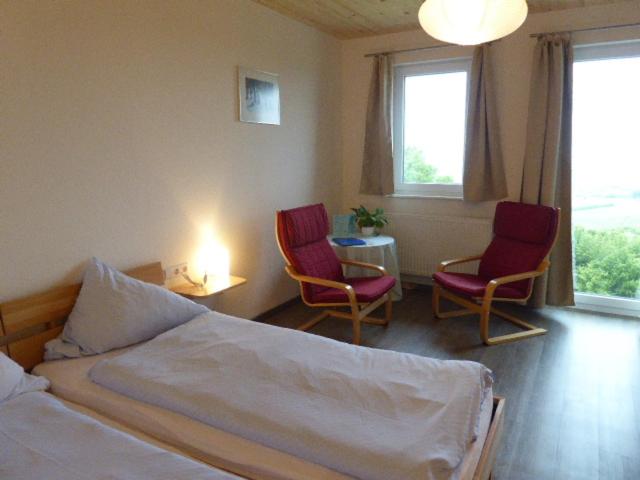 Postel nebo postele na pokoji v ubytování Hotel Hohe Flum