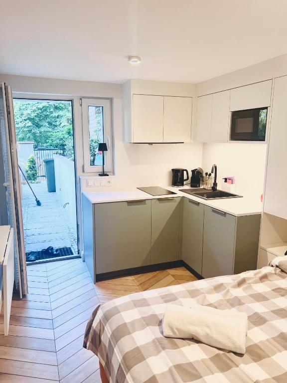 Postel nebo postele na pokoji v ubytování Costa Apartments