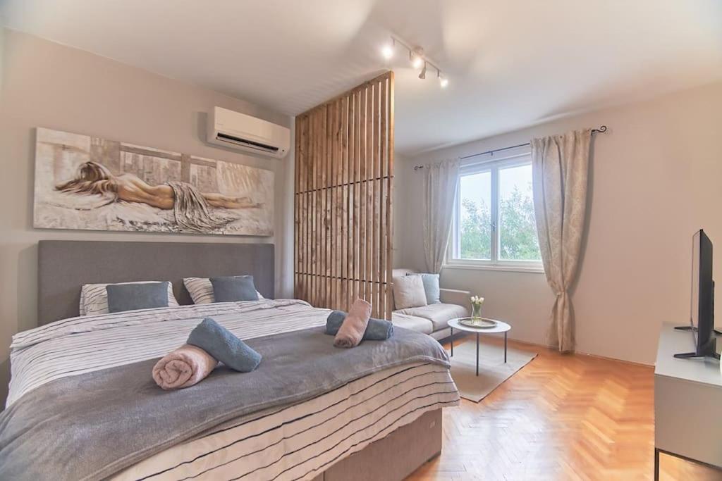 Katil atau katil-katil dalam bilik di Apartment Bigeste - free parking - 2 minute walk to the beach - superfast wifi